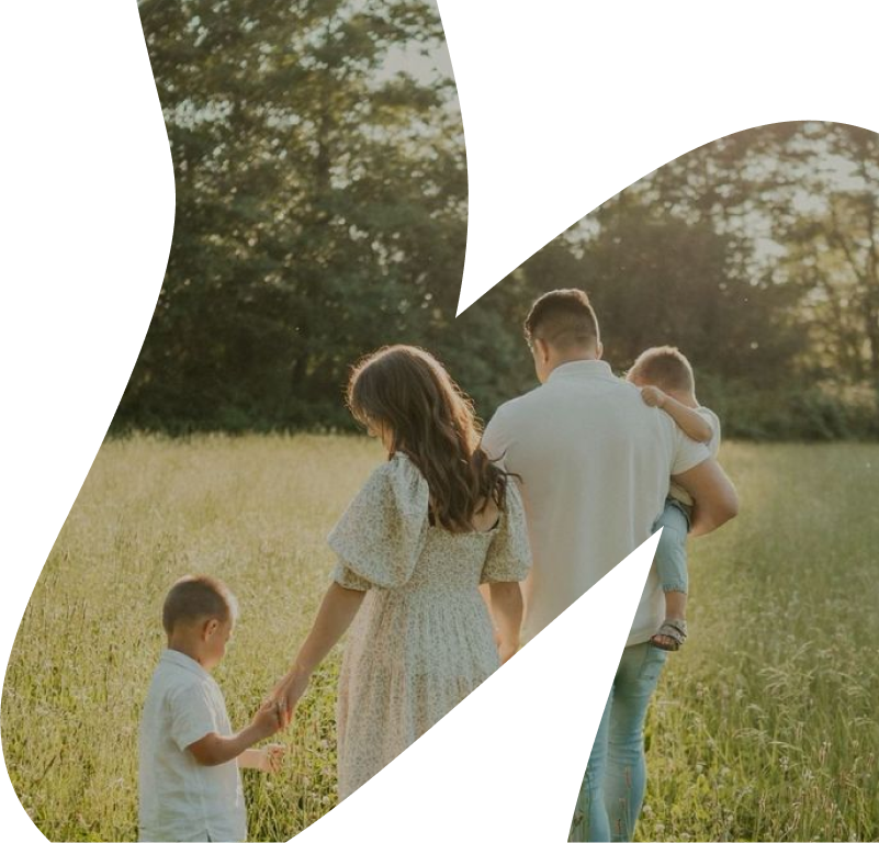 Family walking together in a field